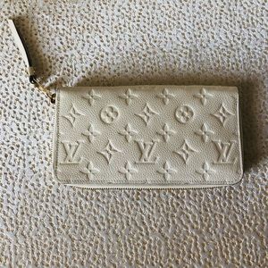 LOUIS VUITTON IVORY EMPRIENTE ARTSY ZIPPY WALLET. DUST COVER. SERIAL # SP1192.